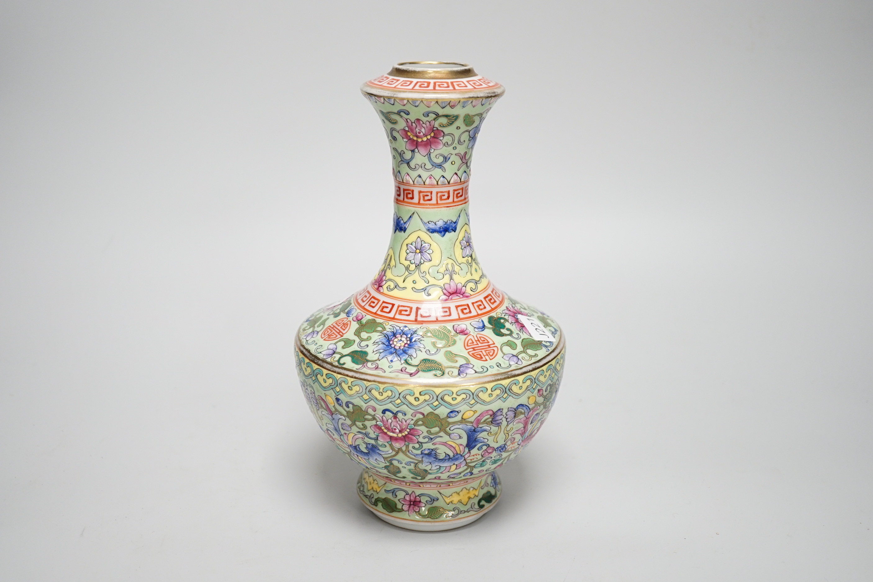 A Chinese enamelled porcelain celadon ground vase, 23.5cm